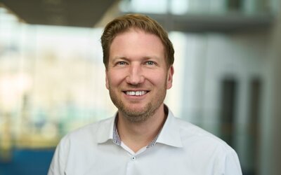 Portrait von Christoph Huschenbett, Fachbereichsleiter Vertrieb bei der EW Energie